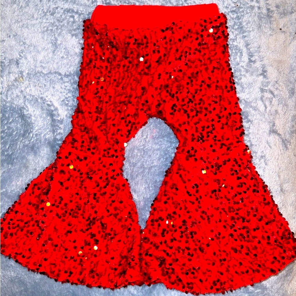Red glitter bell bottom pants